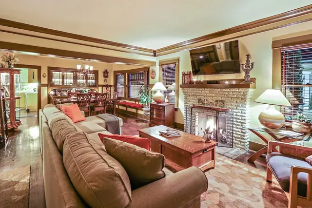 Living room with brick fireplace